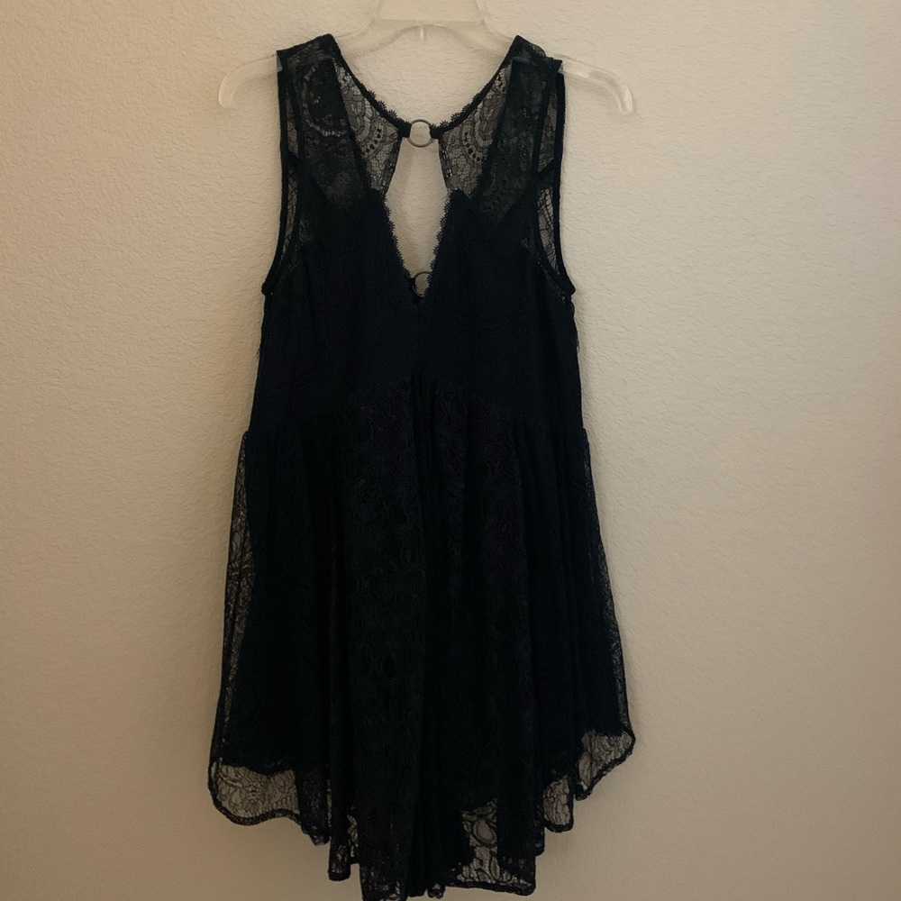 Free People lace dress with cutout. Never worn